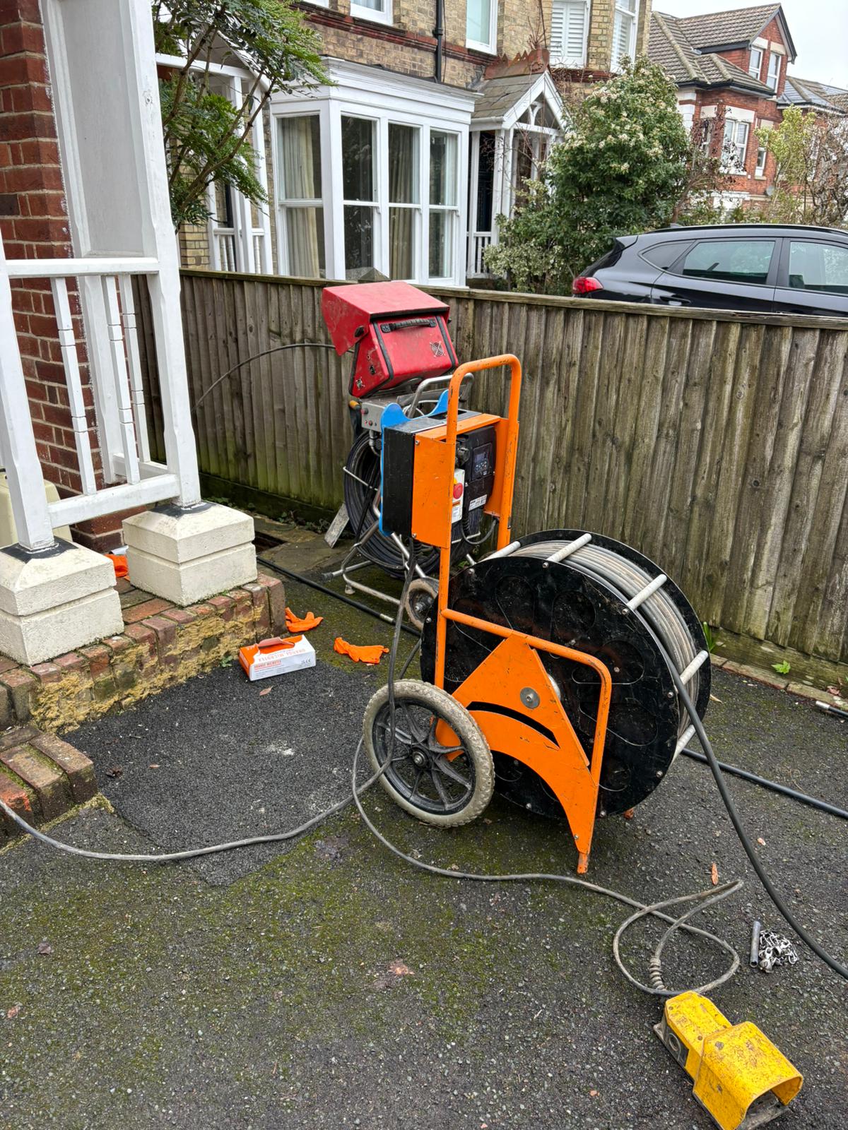 CCTV and jetting equipment set up at a residential drain survey