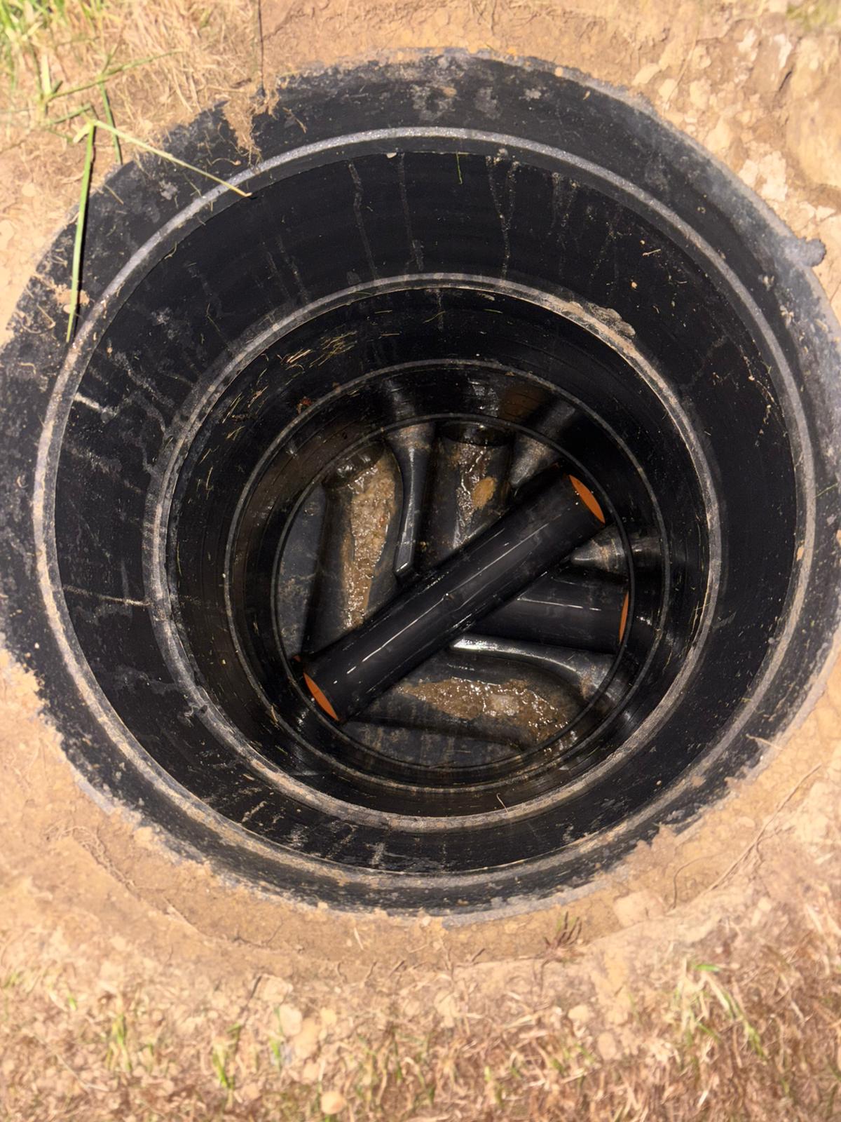 Drain inspection chamber with multiple pipe junctions where rats can enter in Kent, Surrey, Sussex, Essex & London